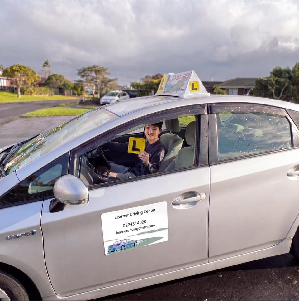A learner driver at the wheel during a lesson